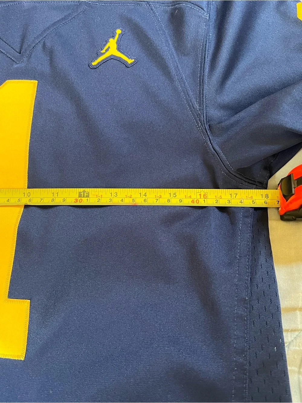 Jordan Navy and Yellow Football Jersey with Number 1